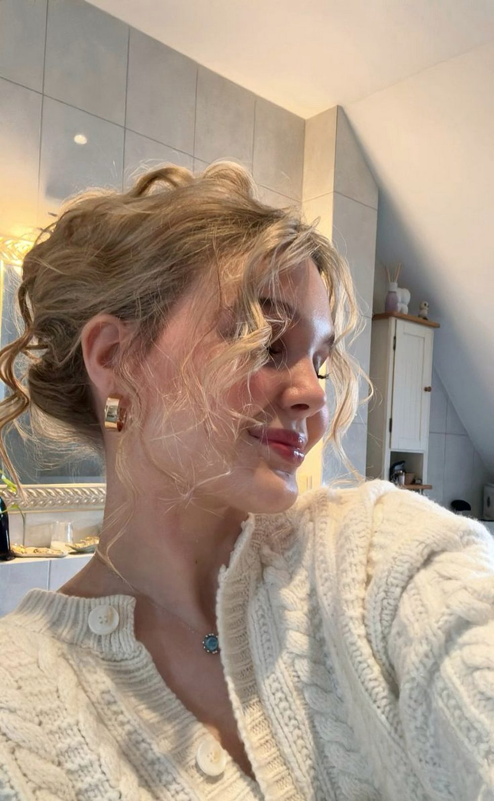 Soft Curly Messy Updo with Face-Framing Tendrils